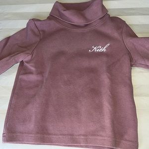Kith lavender toddler girl, turtleneck, and very good condition worm twice.